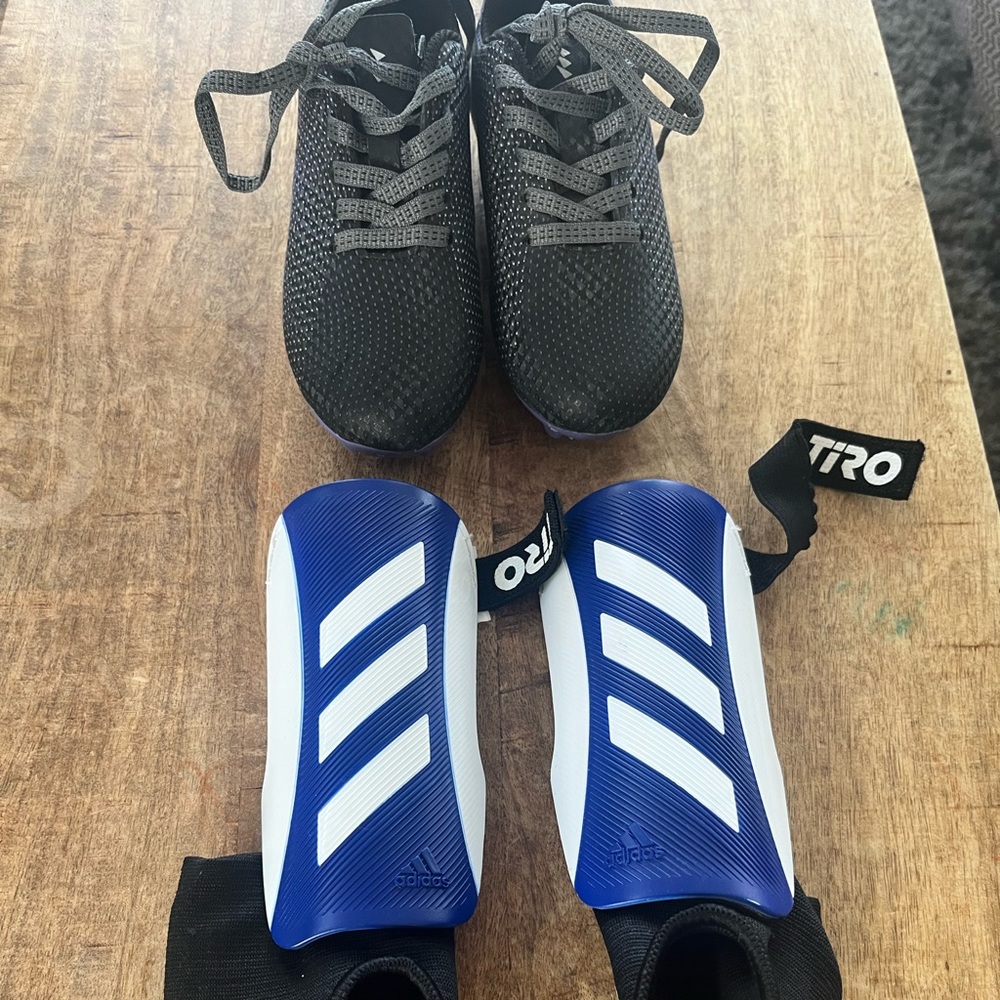 Toddler size 9 soccer cleats and shin guards . Excellent condition.